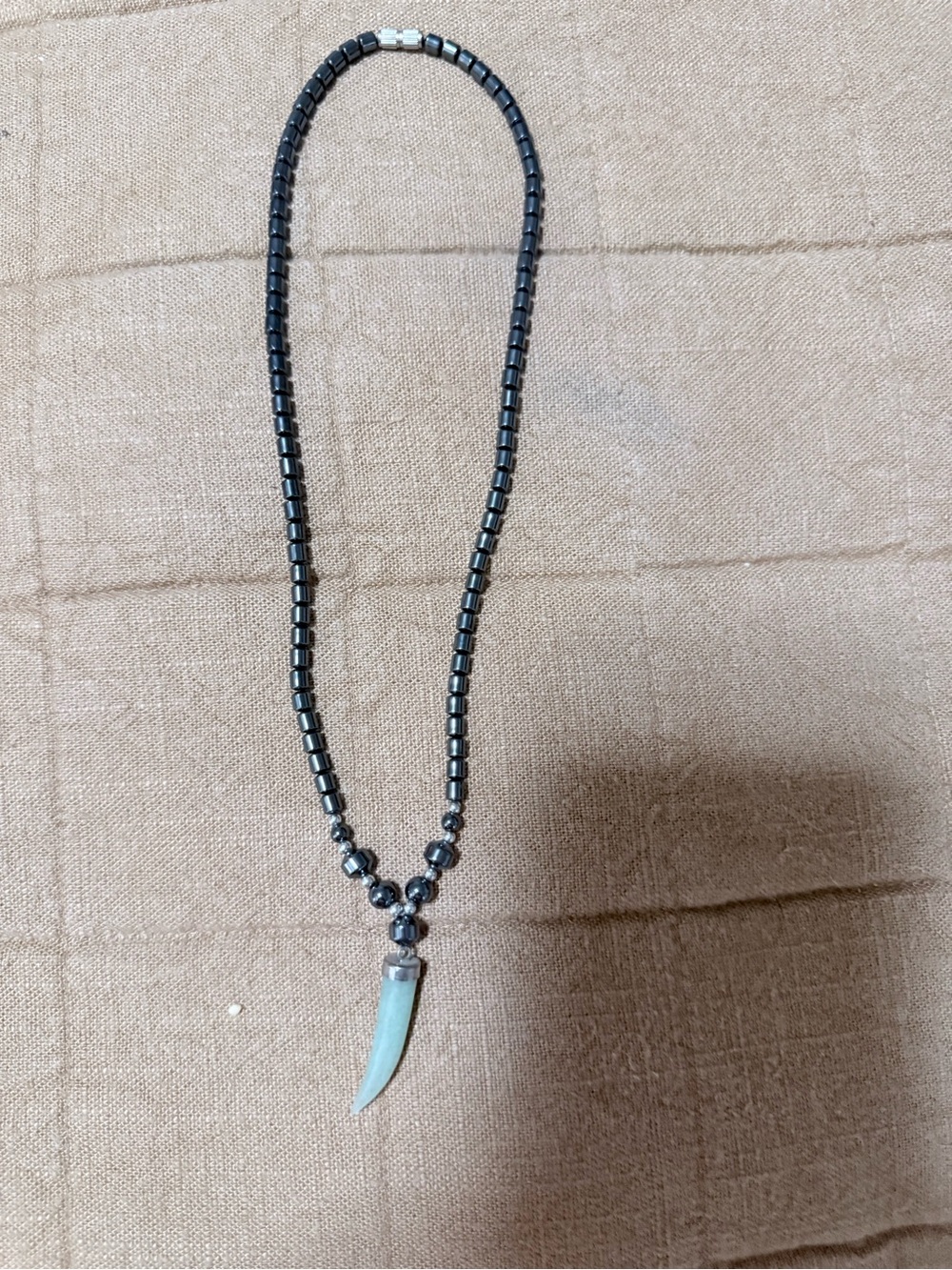 Hematite Bead Necklace with Light Blue Horn Pendant
